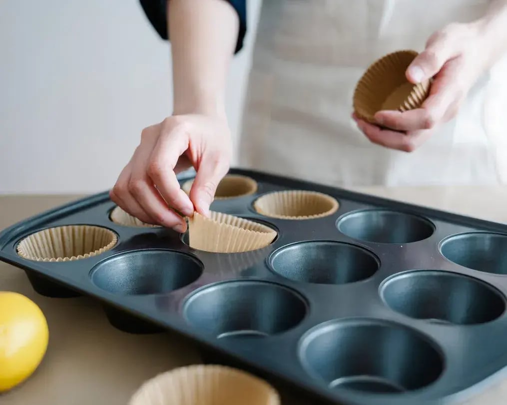 paper cups arranged in muffin tin