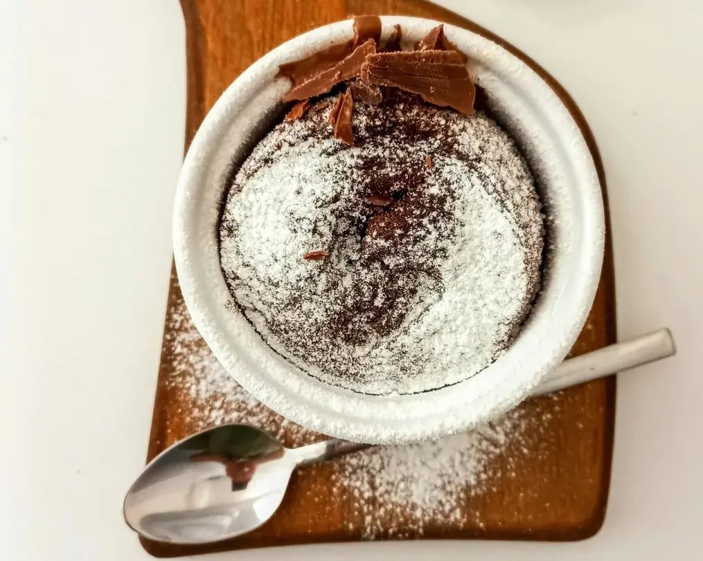 Chocolate Lava Cake with Sugar Dusting and Chocolate Bits