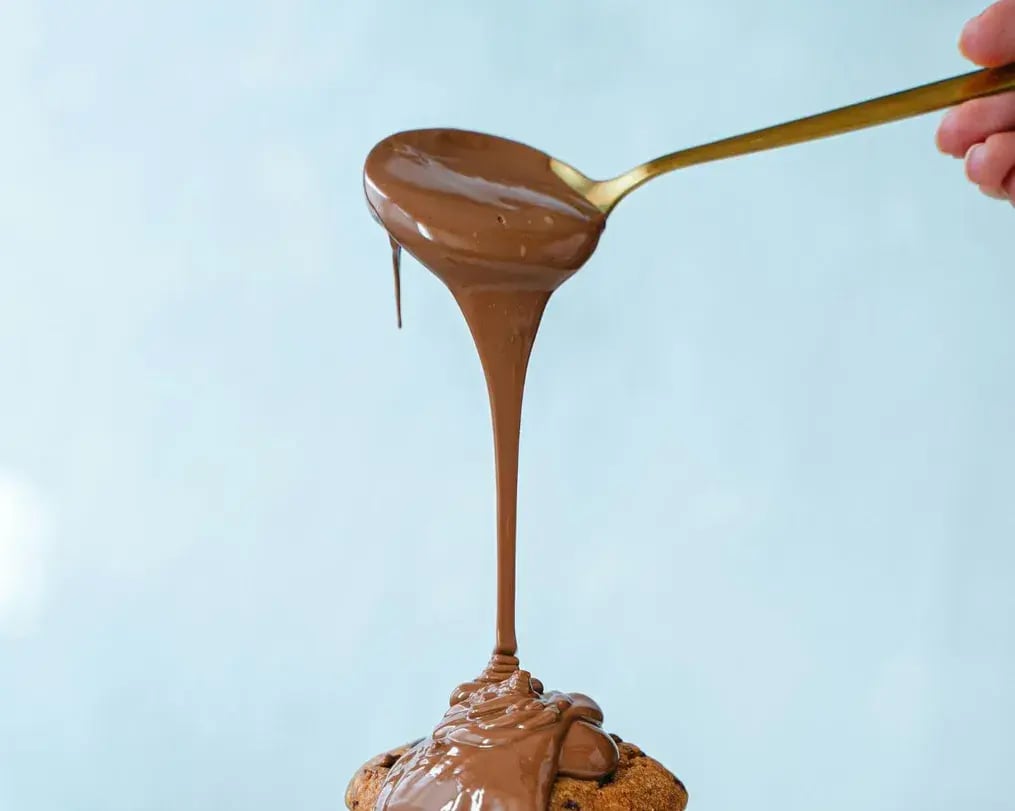 chocolate drizzle on dessert