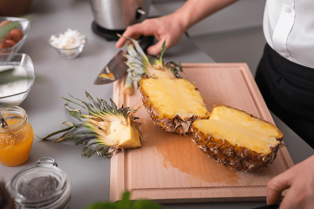cutting-pineapple-representational-image-3