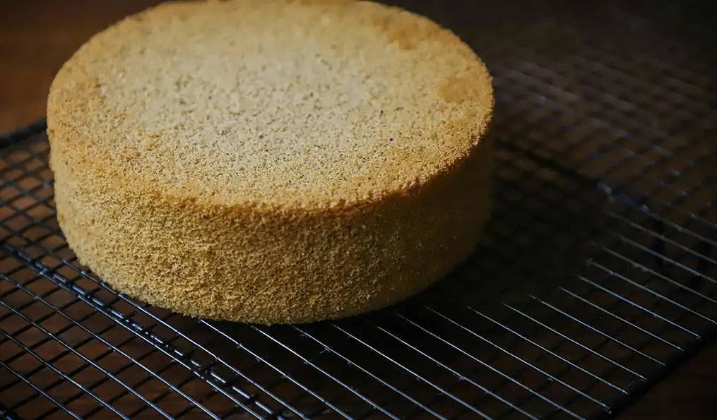 Bake an Orange Sponge Cake for a Refreshing Twist on a Traditional Dessert - Orange Sponge Cake On The Cooling Rack Before Frosting 2