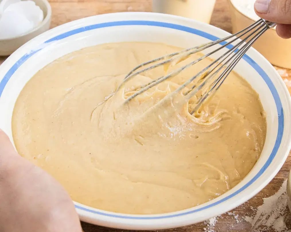 Cake batter with chocolate and raisins