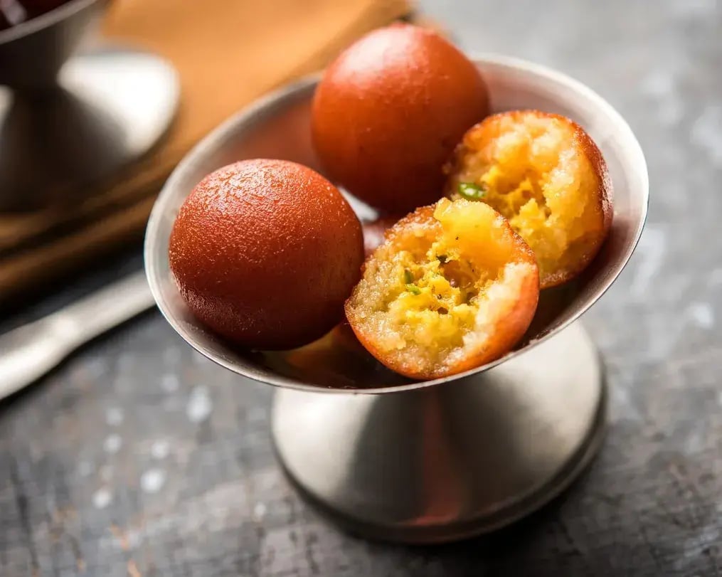 Gulab Jamuns Soaked In Sugar Syrup