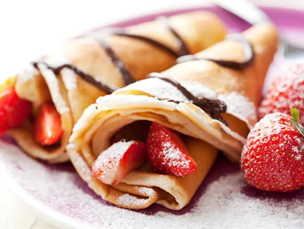 Rolled Crepes With Chocolate Or Caramel