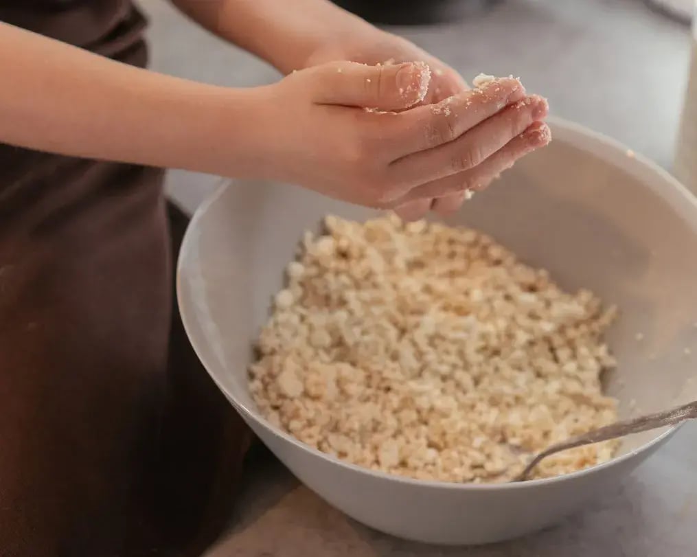 hazelnut biscuit crumbs being prepared
