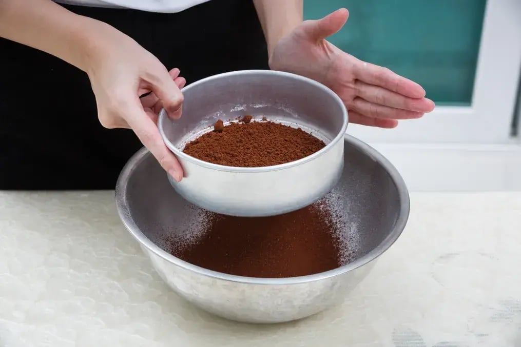 Sift in Cocoa Powder