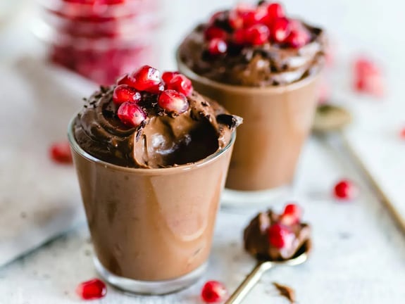 Chocolate mousse with raspberry swirl and pistachios