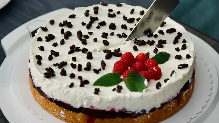 Torte Cake Being Sliced