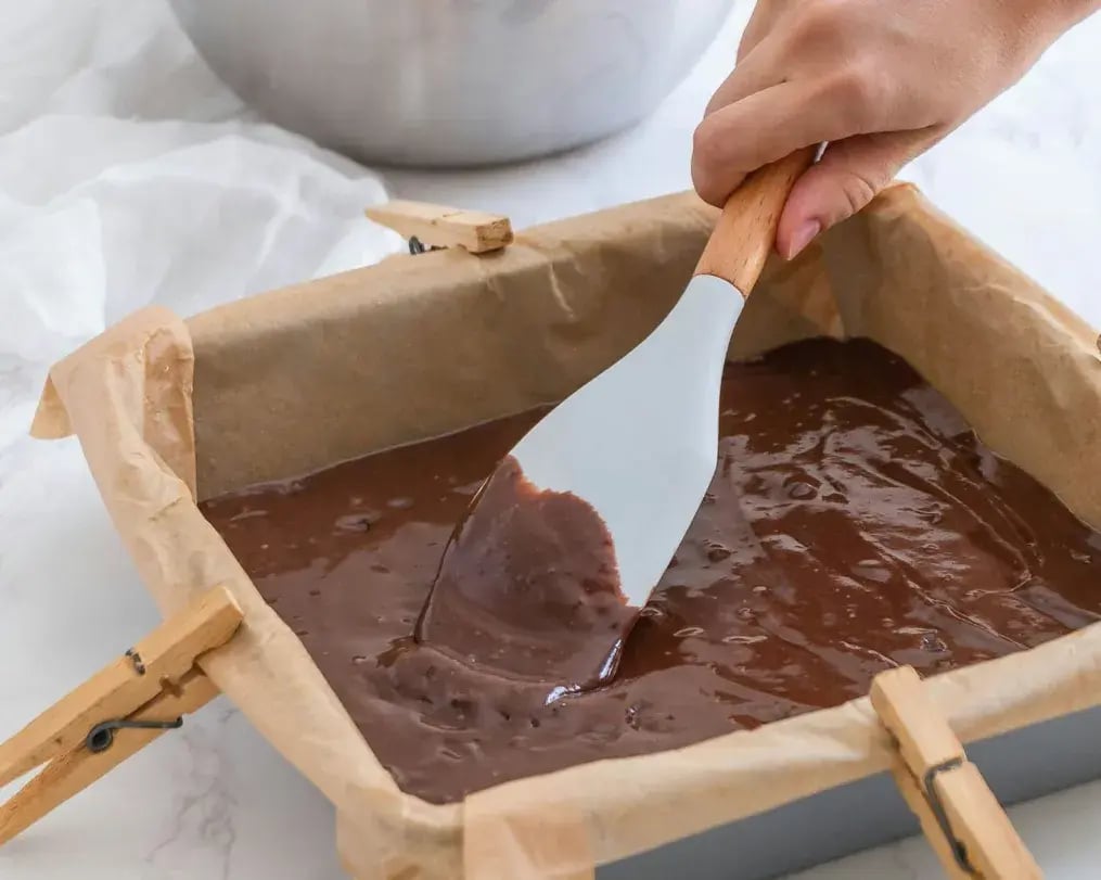 Classic Black Forest Dump Cake with Dairy Milk Shavings: A Baking Guide - Cake batter pored over cherry filling for Black Forest Dump Cake Dairy Milk Shavings