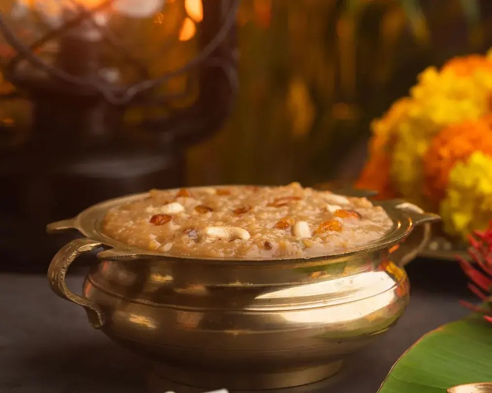 thick coconut milk kheer with dates and nuts and raisins