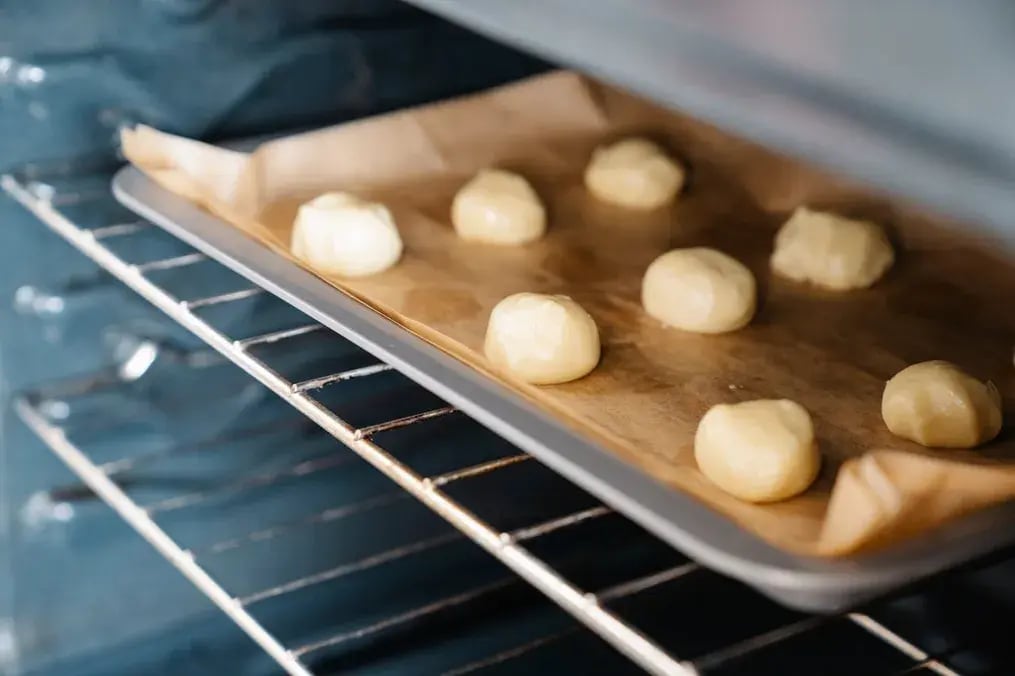 Not Letting the Dough Cool Before Adding Eggs
