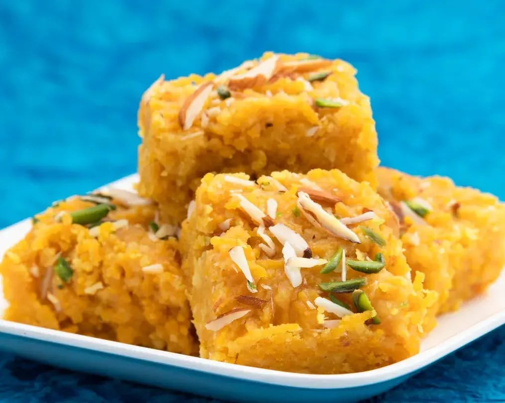 besan halwa pieces on a plate
