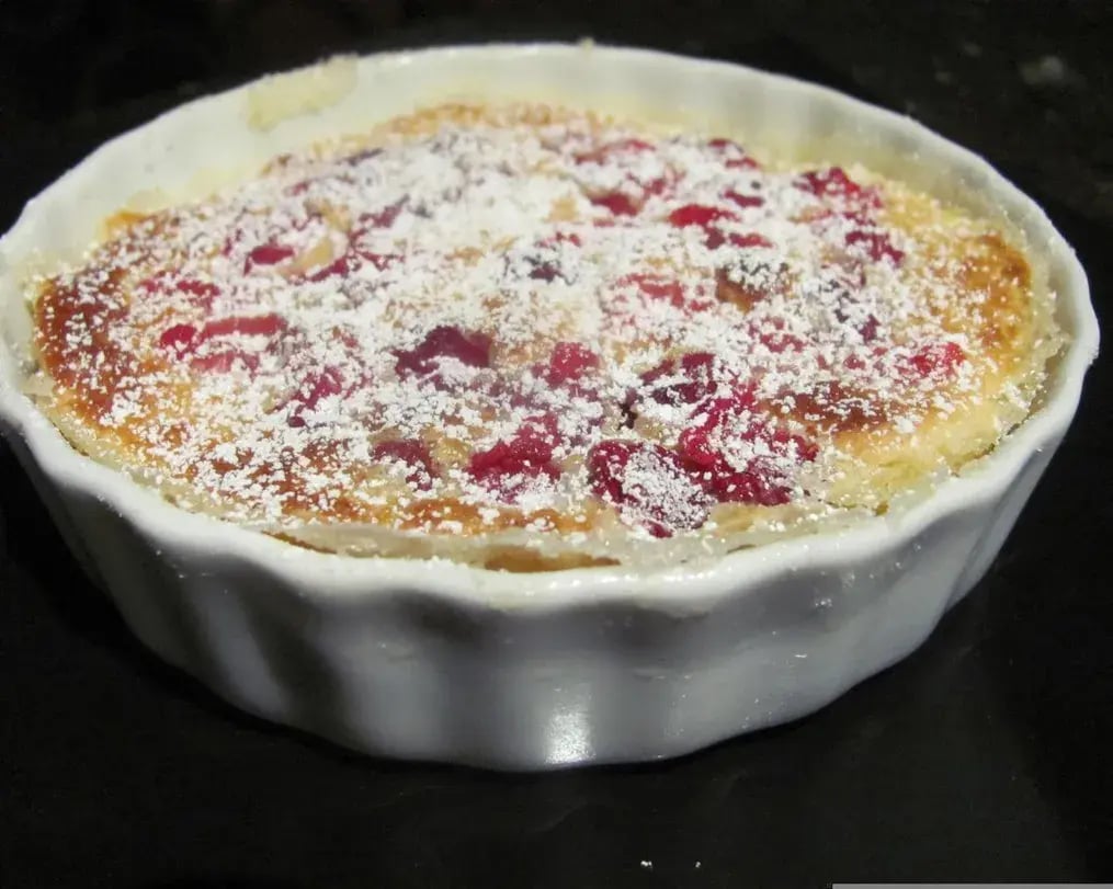 Frozen Lemon Souffle with Pistachios and Oreo Crumble: A Refreshing Dessert - Freshly prepared Lemon Souffle with Garnishes Ready to be Frozen