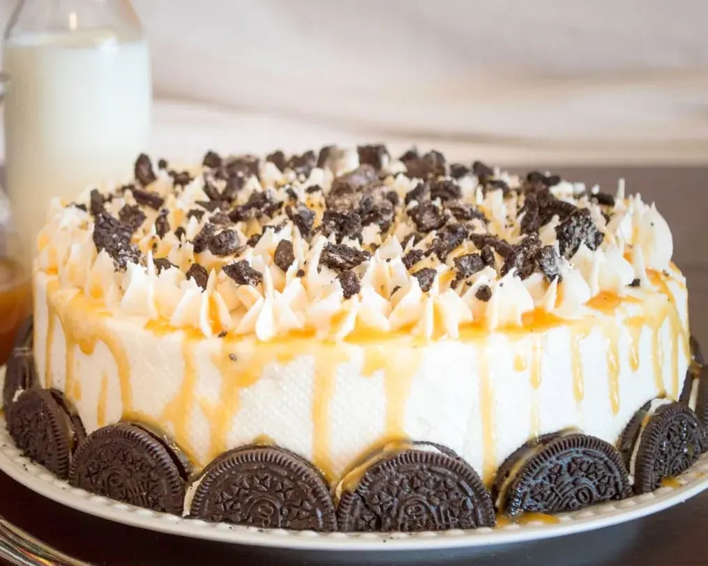 Oreo decorated cream cheese frosted cake