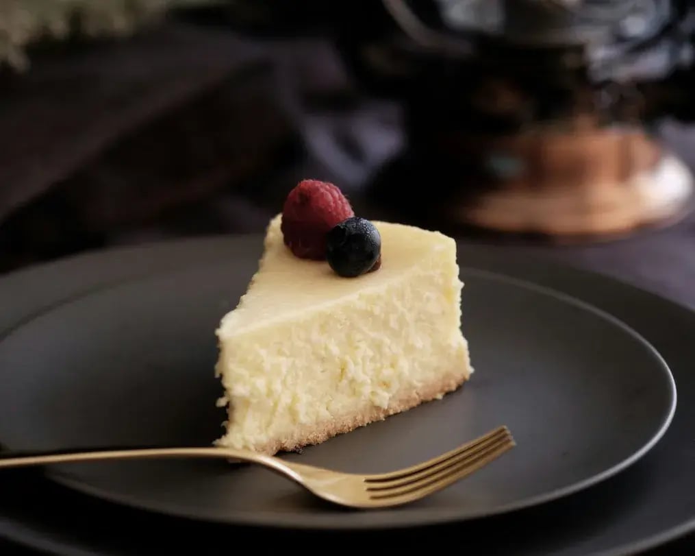 Cardamom Chai Cheesecake with spoon