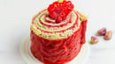 Luxuriate in the elegance of swirled delights of a red velvet Swiss roll
