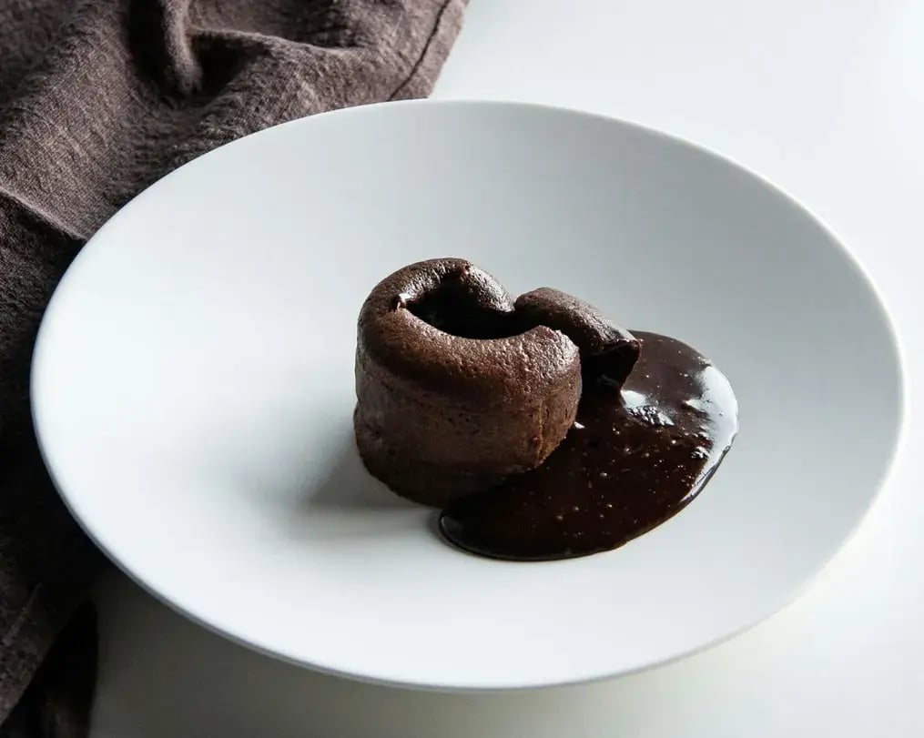 Chocolate lava cake cut with oozing center