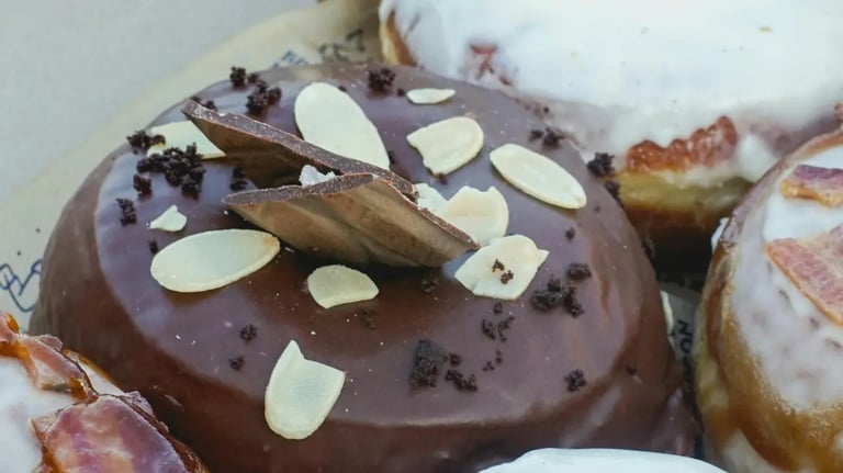 Mocha chocolate frosting with crushed almonds