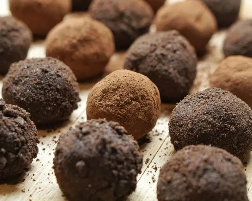 Oreo chocolate balls lined on parchment