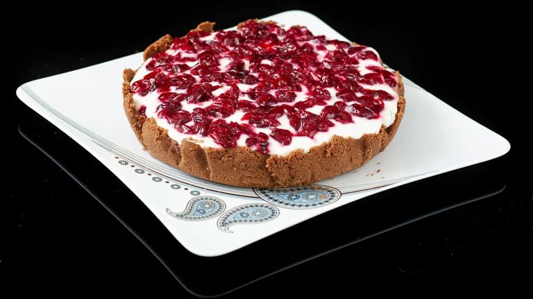 Raspberry Swirl Cheesecake on Hazelnut Crust