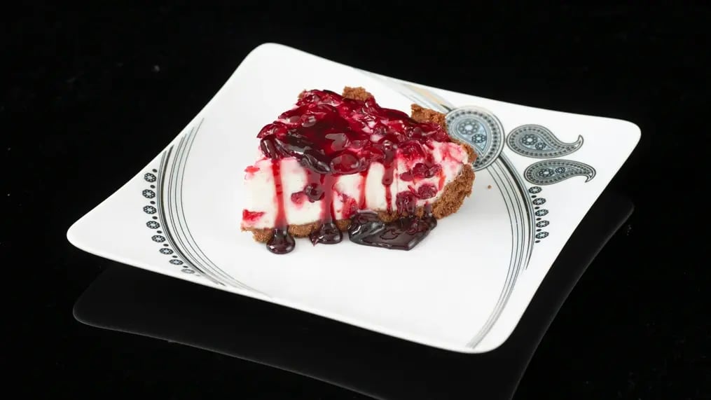 Raspberry Swirl Cheesecake on Hazelnut Crust