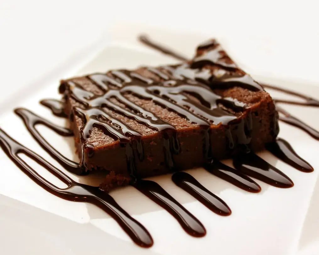 Fudge Cake Slice With Chocolate Drizzle
