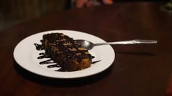Sticky Pecan Bars with Melted Silk Chocolate Glaze