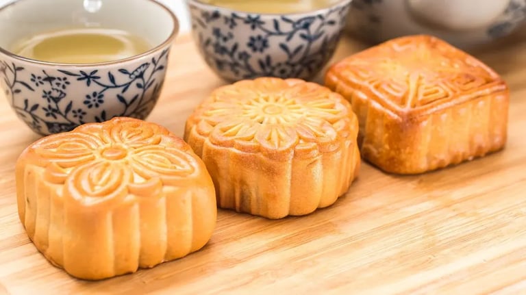 Feature Image - Traditional Chinese Mooncakes Served With Chinese Tea