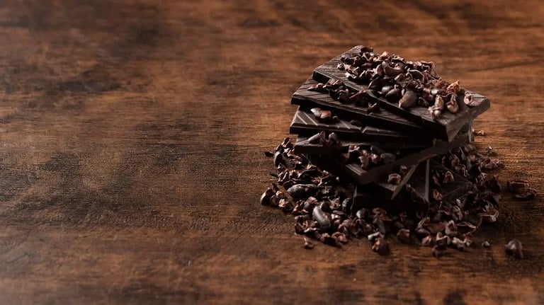 Feature Image - Dark chocolate barks stacked up with chocolate shavings