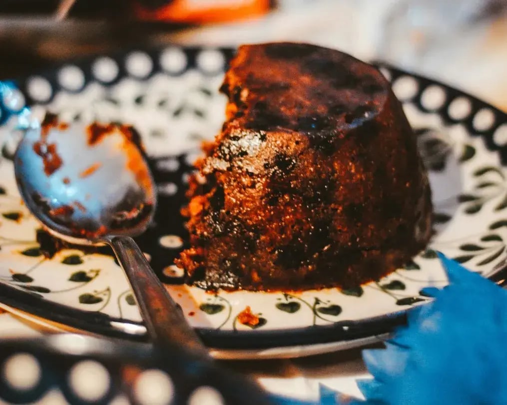 Half eaten christmas pudding