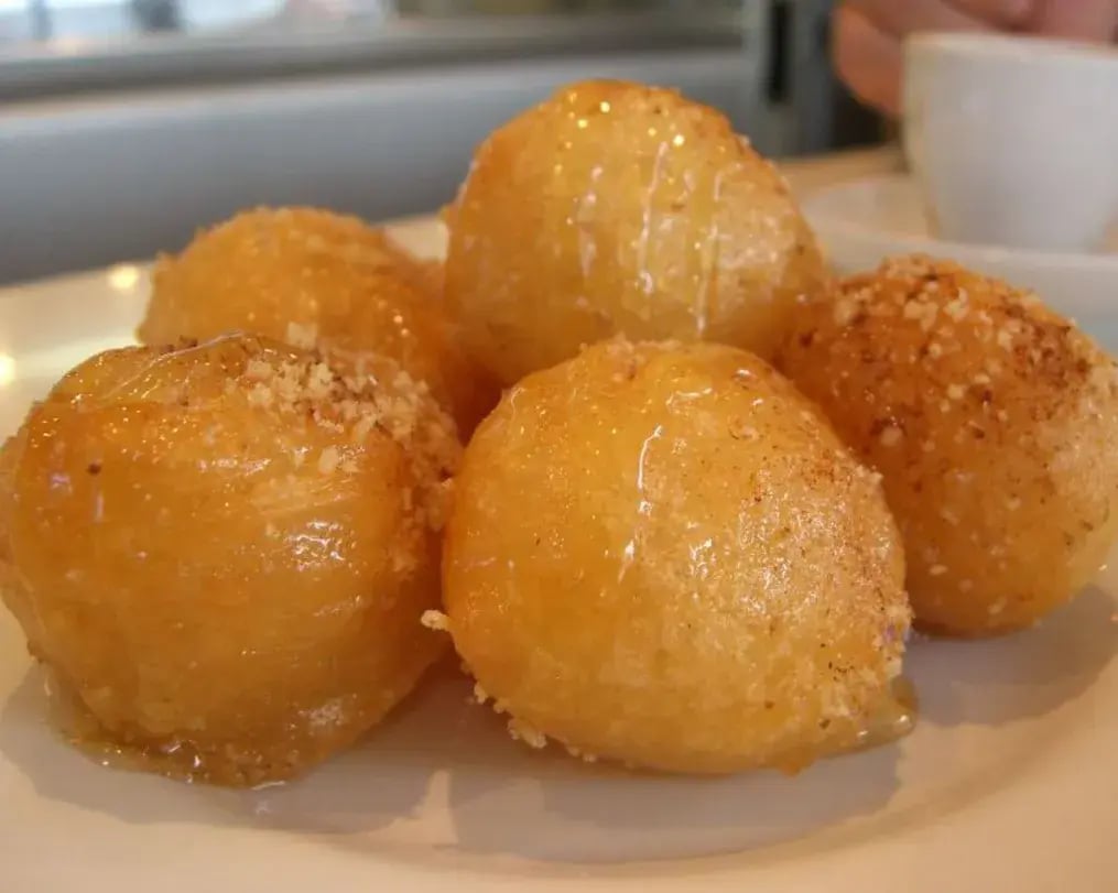 Greek Loukoumades Closeup With Nuts