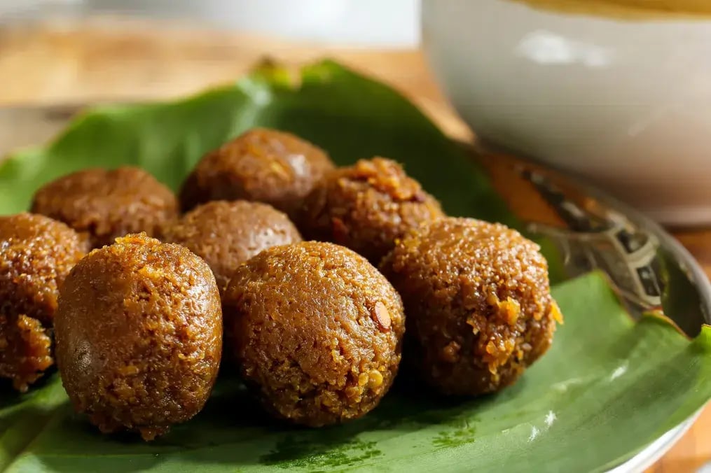 Women’s Day High Tea: Dessert Ideas to Serve with Your Favorite Brews - Coconut And Jaggery Ladoos