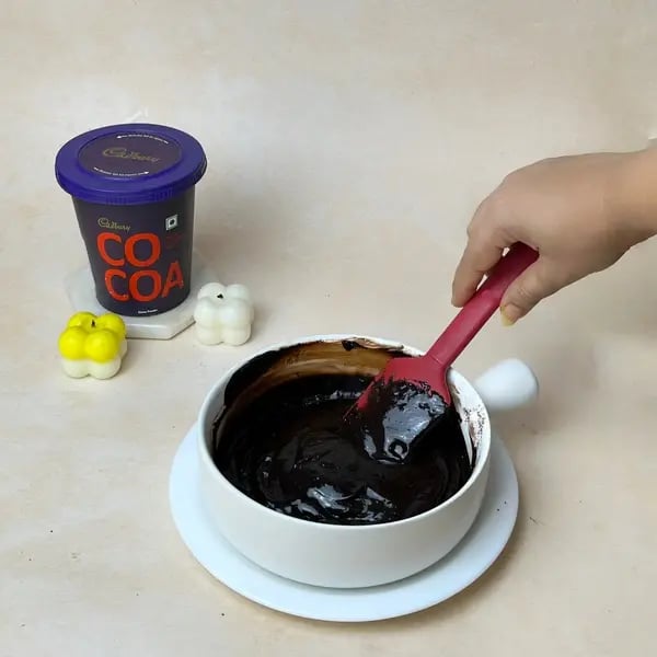 2-Ingredient Cocoa Fudge - Stirring Fudge Mixture