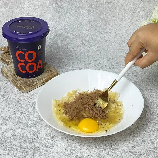 3 Ingredient Cocoa Banana Cupcake-Add egg and mix all ingredients