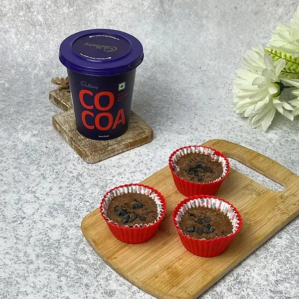 3 Ingredient Cocoa Banana Cupcake-Grease cupcake molds using butter
