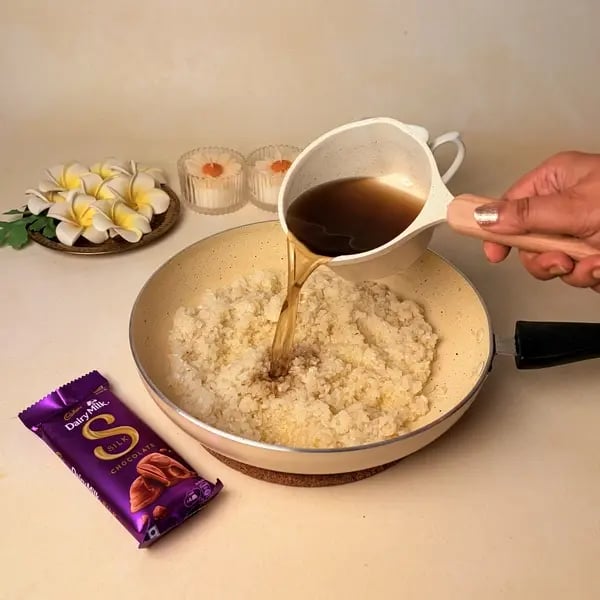 Ada Pradhaman With Cadbury Dairy Milk Silk For Onam - Pouring Jaggery Syrup