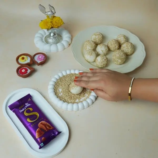 Anarsa Recipe With Dairy Milk Silk: Give This Traditional Diwali Sweet A Gooey Chocolate Center - Coating Balls Sesame Seeds