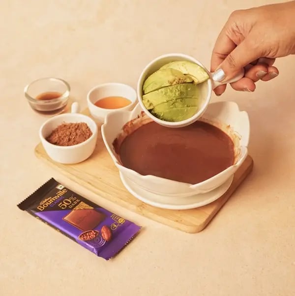 Avocado and Chocolate Bournville Tart with Nuts-Add the avocado cocoa powder honey