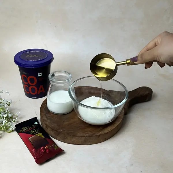Bakery-Style Double Chocolate Bournville Cocoa Muffins - Whisking Wet Ingredients