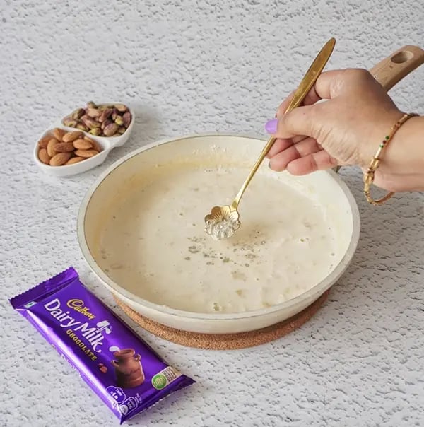 Basundi With Dry Fruits and Cadbury Dairy Milk Chocolate-Add cardamom powder