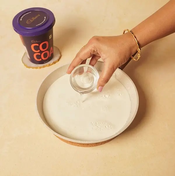 Bengali Rosogolla with Chocolate Twist-Bring the milk to a boil