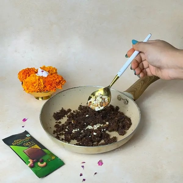 Beyond Ukadiche, Try This Easy Dairy Milk Stuffed Fried Modak Recipe - Stirring Chocolate Mixture