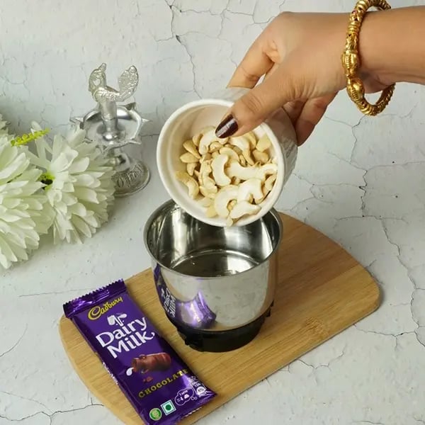 Bhai Dooj Special Dairy Milk Cashew Lotus Sweet-Add cashew nuts to the jar