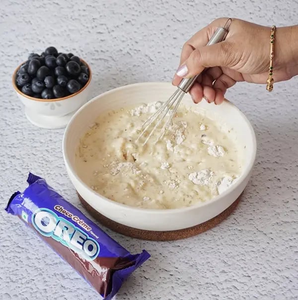Blueberry Coffee Cake with Oreo Crumble and Almonds-Combine wet and dry ingredients