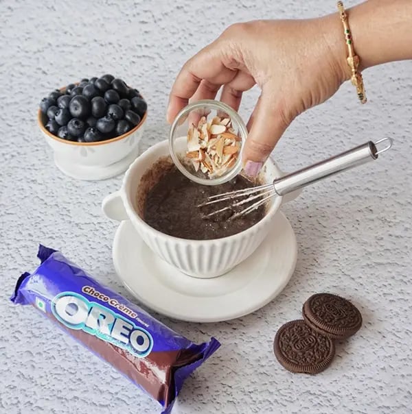 Blueberry Coffee Cake with Oreo Crumble and Almonds-Stir in the chopped almonds and give it a good mix