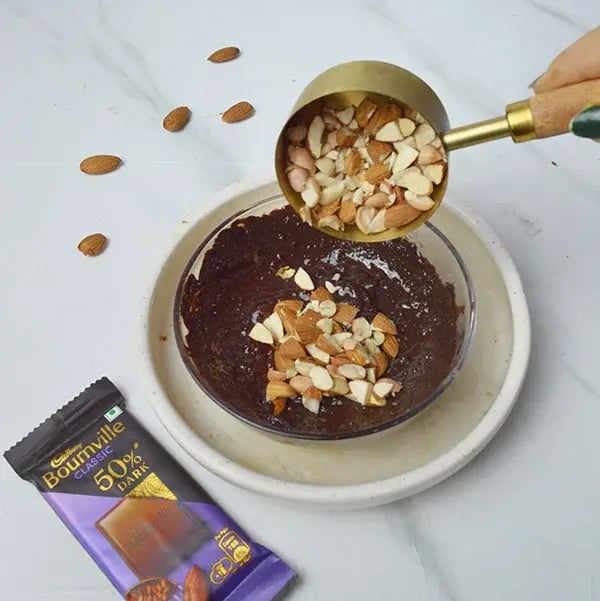Bournville Almond Chikki Sweet - Add chopped almonds