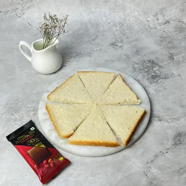 Bournville Banana Bread Pizza Dessert - Spreading Melted Chocolate