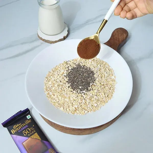 Bournville Chia Oatmeal Recipe - Oats And Milk Simmering