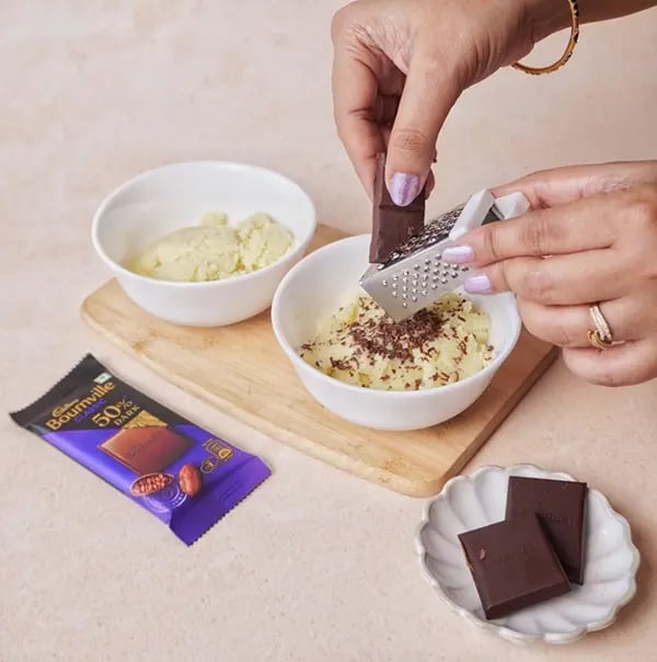 Bournville Chocolate and Khowa Barfi-Remove from heat and divide the mixture
