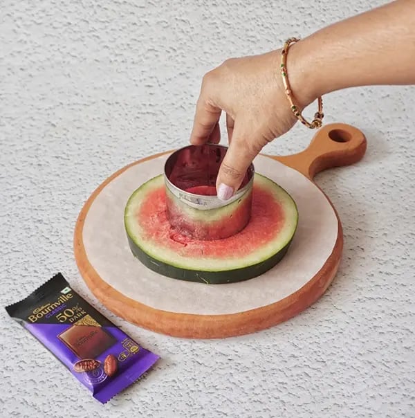 Bournville Chocolate and Watermelon Lollipops-With the help of a round cookie cutter